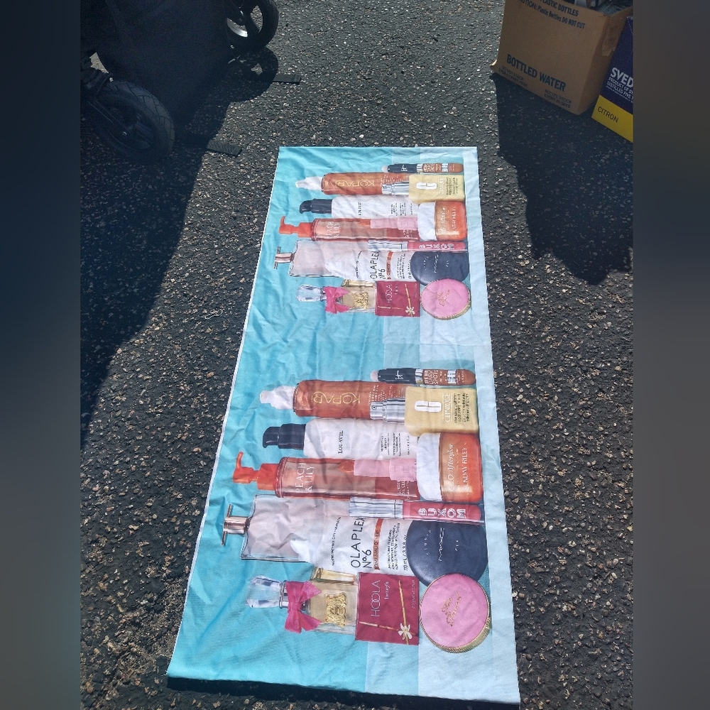 Colorful Beauty Product Banner That Goes Around Sales Table